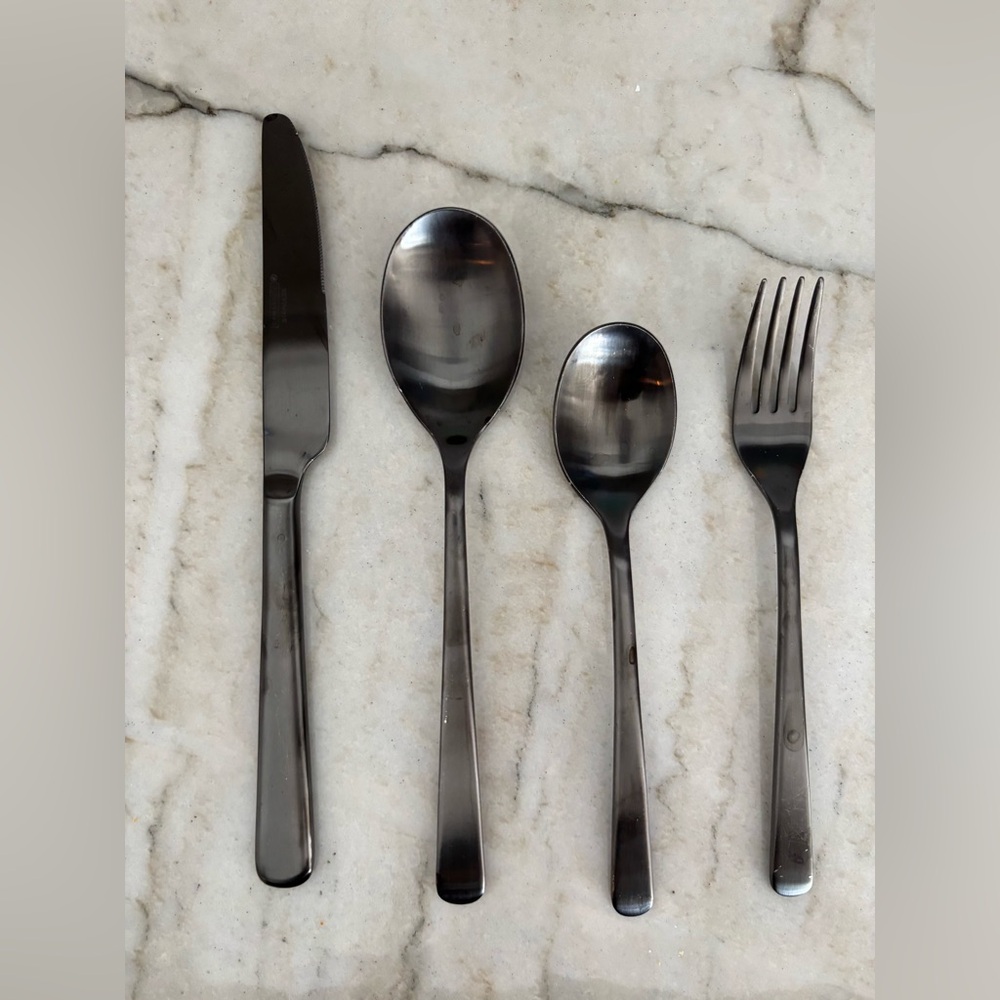 Onyx color stainless steel flatware set of 6. Plus steak knives.